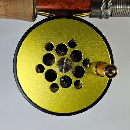 #4 Black and yellow full cage fly reel.