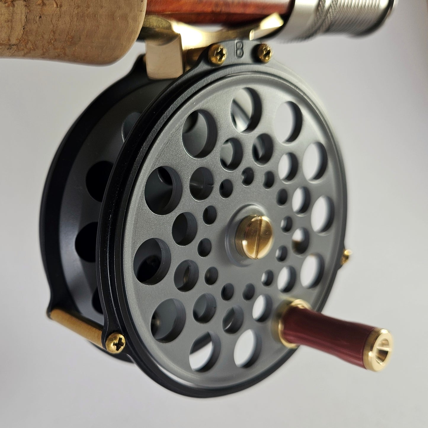 #4 / 5 Black and grey raised pillar fly reel